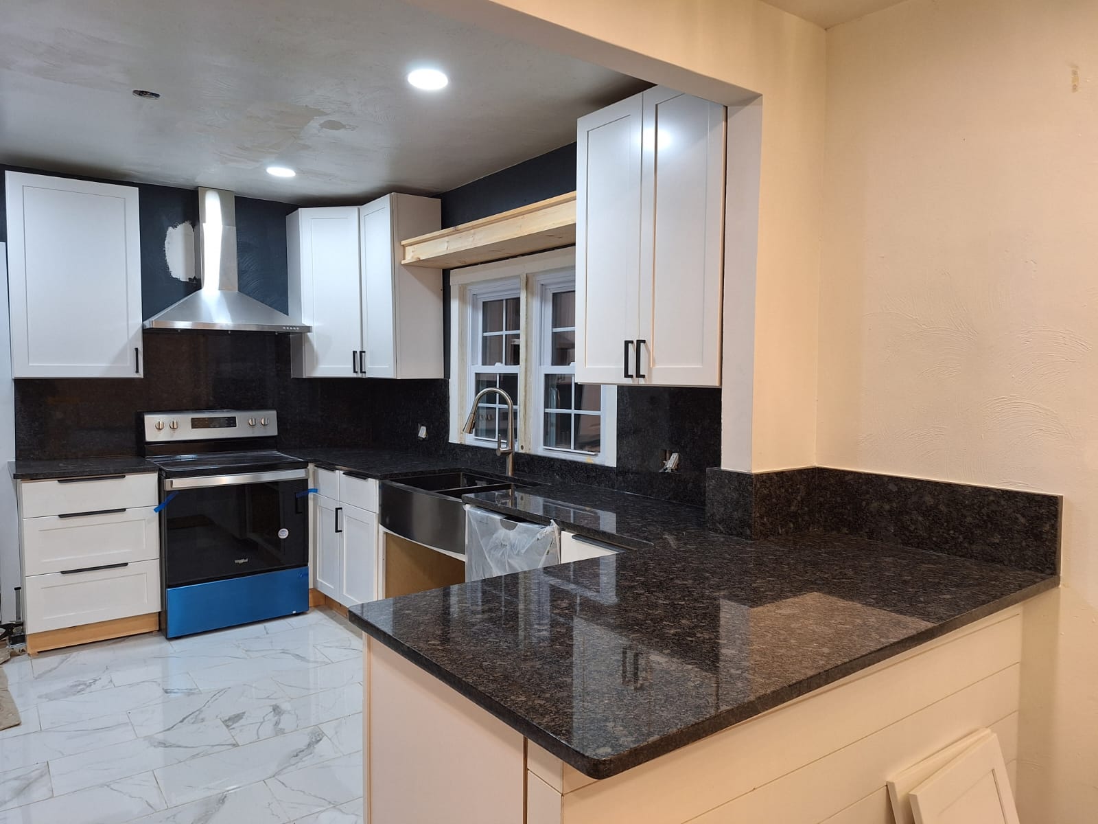 Granite kitchen countertop installation in Petersburg, VA by 3 J’s Granite & Marble Services.