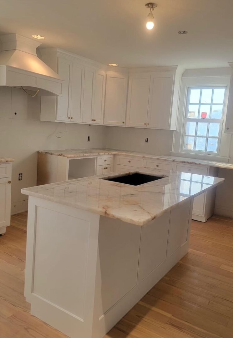Quartzite kitchen countertop installation in Ashland VA by 3 J’s Granite & Marble Services.